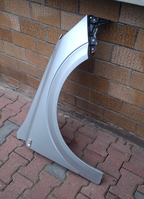 Błotnik Opel Astra H III   Z157