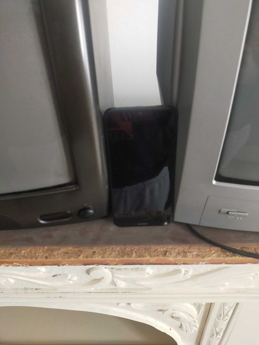 TV + telemóvel Huawei