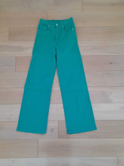 zielone jeansy wide leg H&M