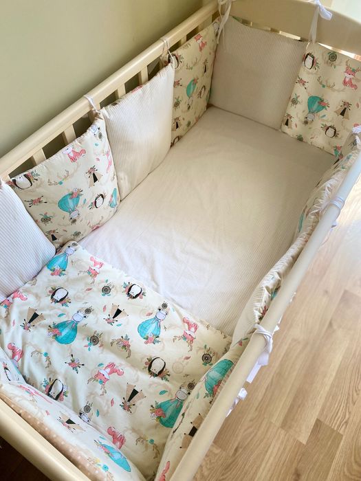 Дитяче ліжечко-манеж