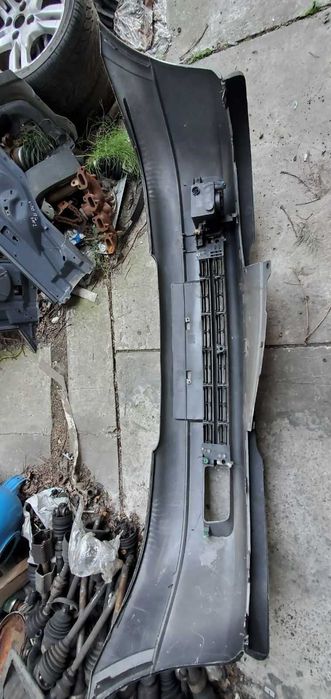 Бампер передній 90559473 Opel Astra G