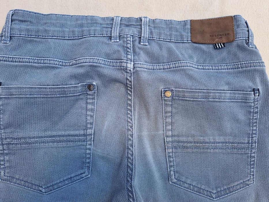 Spodnie chłopięce RESERVED rozm. 31