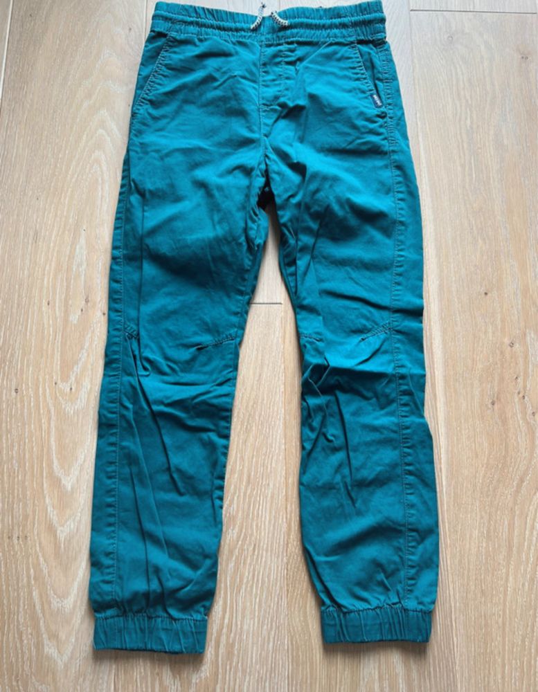 Spodnie joggery H&M 134 morskie zielone Joggersy cienkie bez zapięcia
