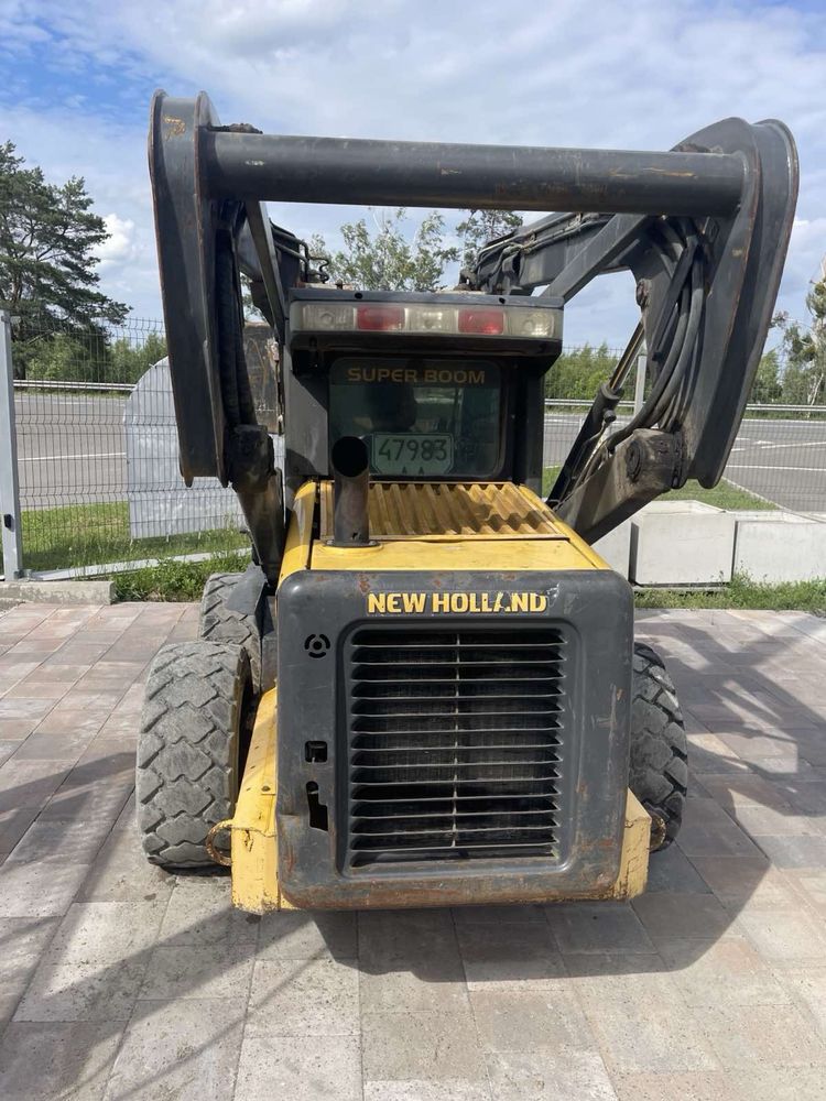 Мінінавантажувач New Holland L180.