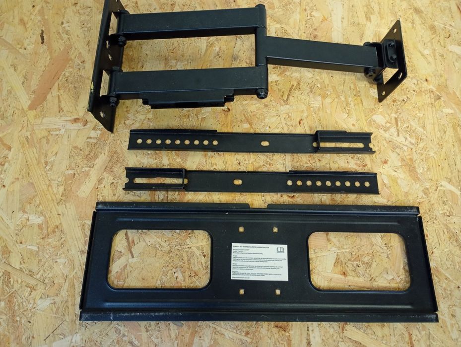 Wieszak pod telewizor do telewizora tv uniwersalny