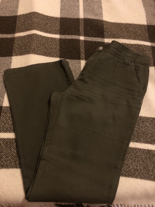 Calças verde escuro