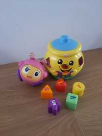 Garnuszek sorter fisher price hula kula