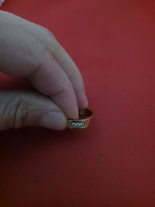 Aliança de aço dourada