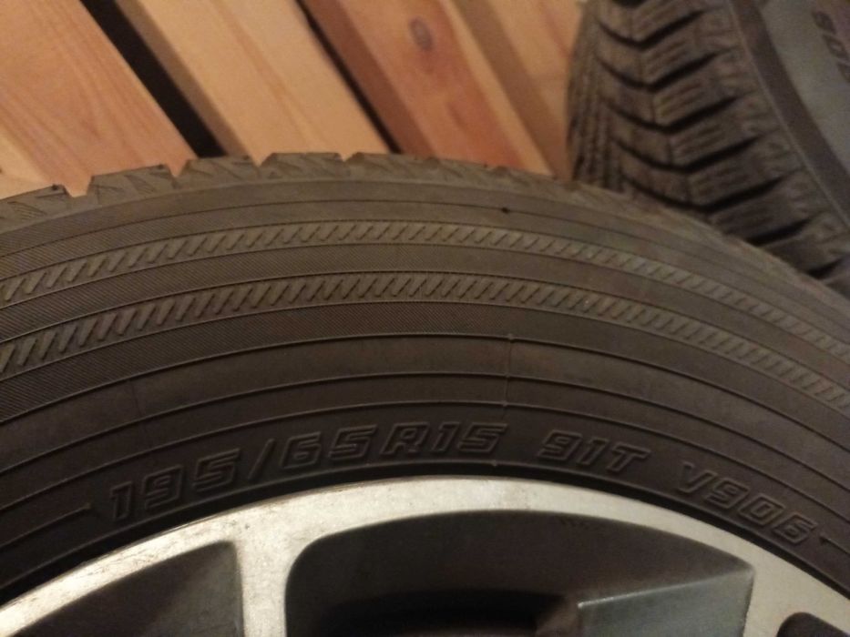 Koła kpl opony zimowe 195/65R15 Yokohama - felgi 5x114,3 z kołpakami
