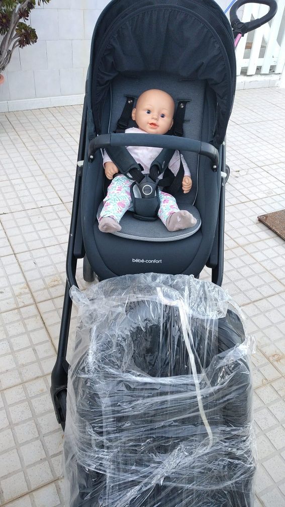 Carrinho de bebé com ovinho