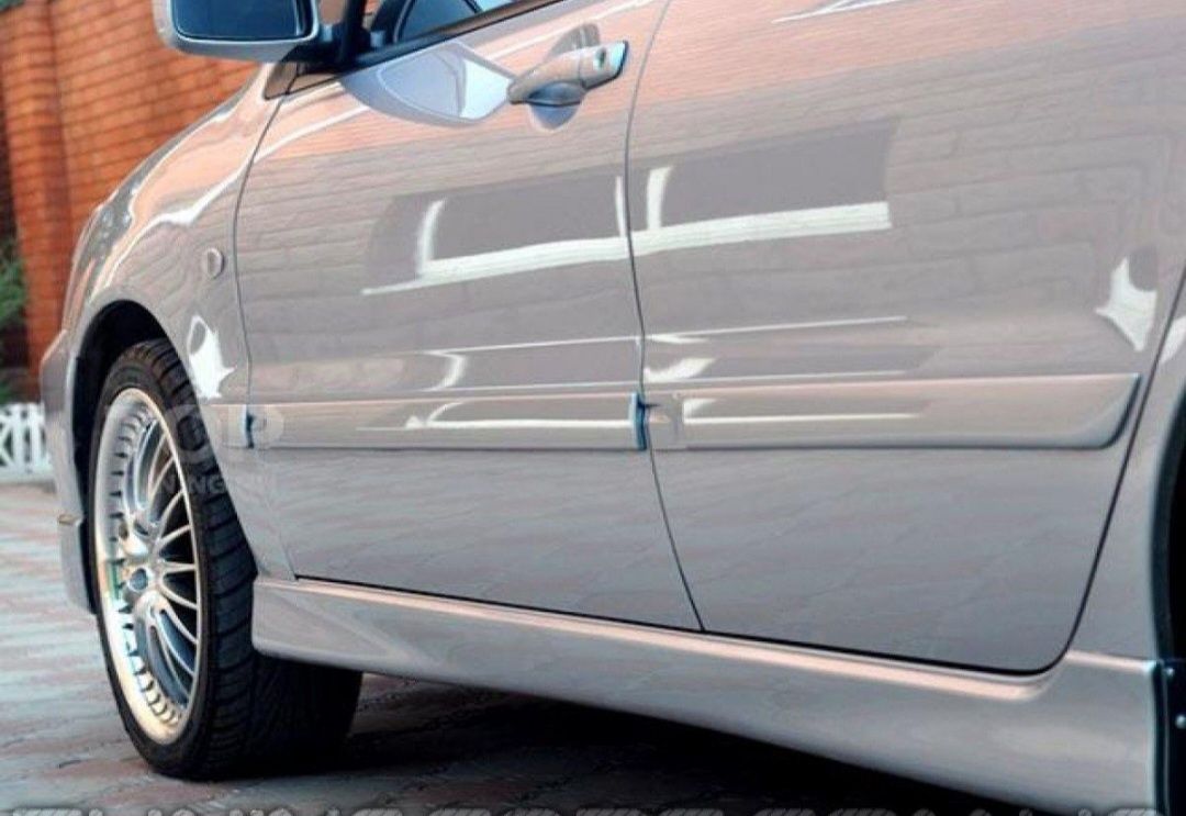 Накладки на бампера на пороги Mitsubishi Lancer 9. Обвес  Ланцер 9