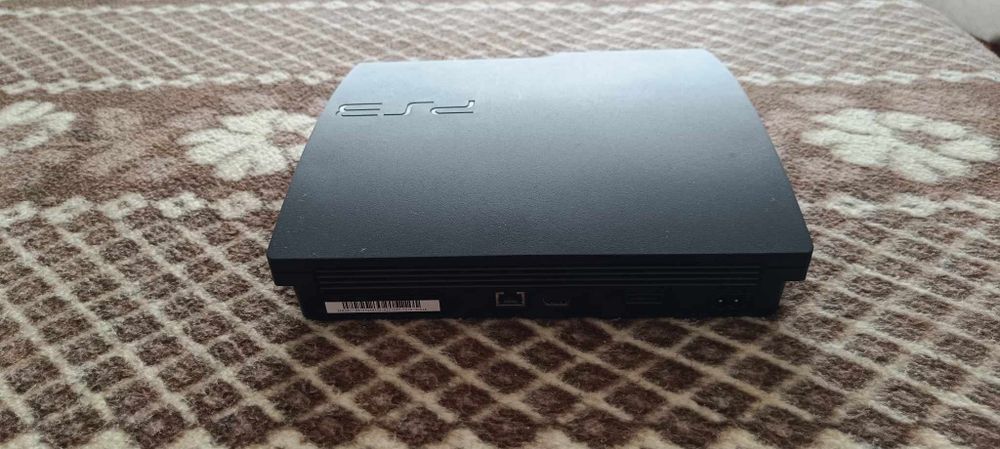 Playstation 3 + comandos move + 2 jogos sports champions + 5 jogos Ps3