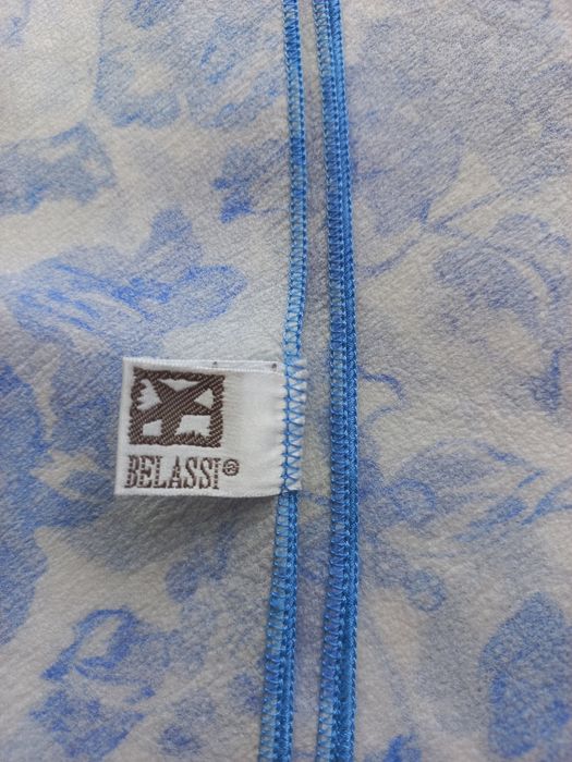 Toalha de mesa redonda azul e branca em poliamida