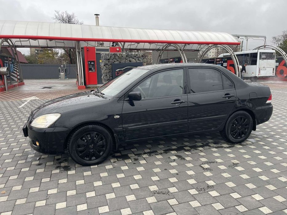 Mitsubishi Lancer 9 1.6 Газ Автомат