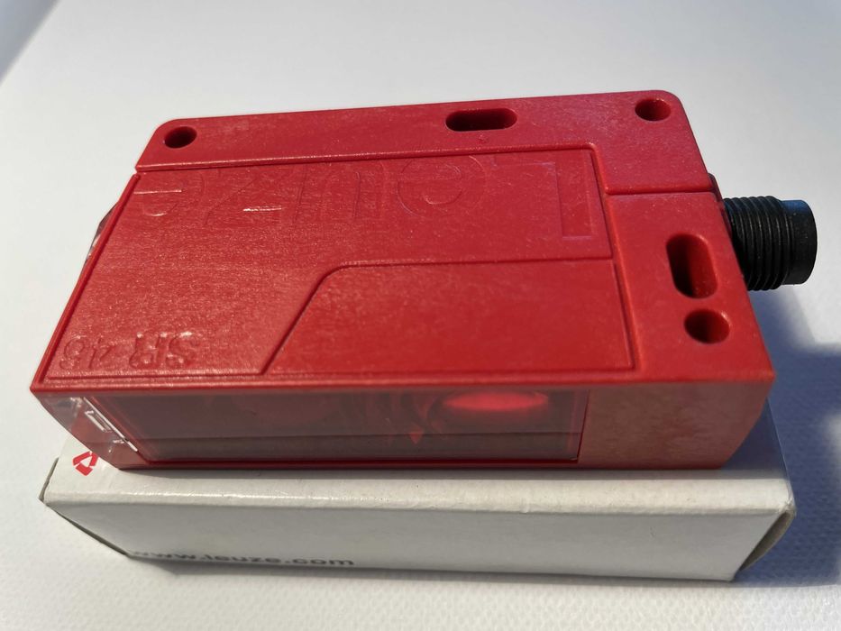 Czujnik optyczny odbiciowy z tłumieniem tła HT46CI/4P-M12, Leuze