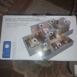 Metalowe kinkiety plus lampa led