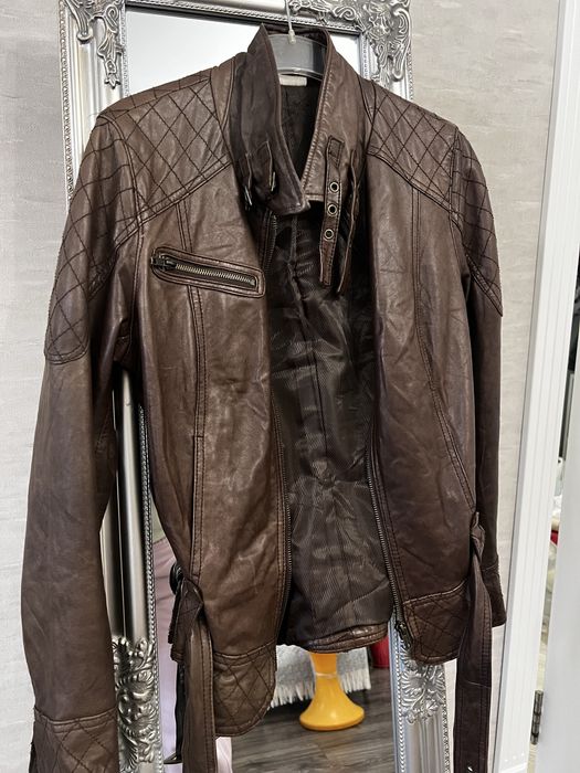 Вінтажна шкіряна куртка