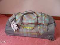 Mala de viagem trolley e bolsa de cintura daikine