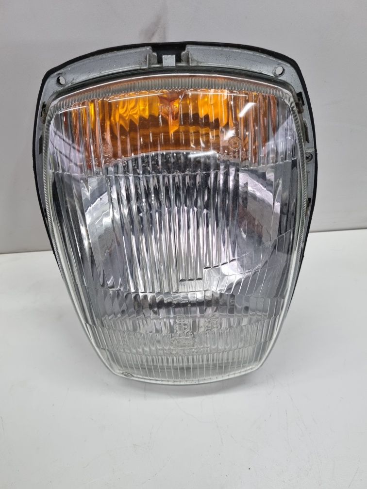 mercedes w114 w115 reflektor lampa nowy oryginalny hella