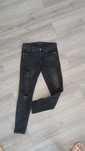 Czarne jeansy z dziurami Zara