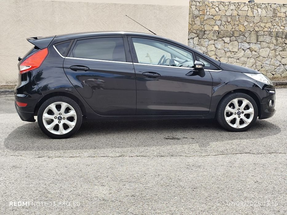 1.25 Titanium NOVO 90mil  kms