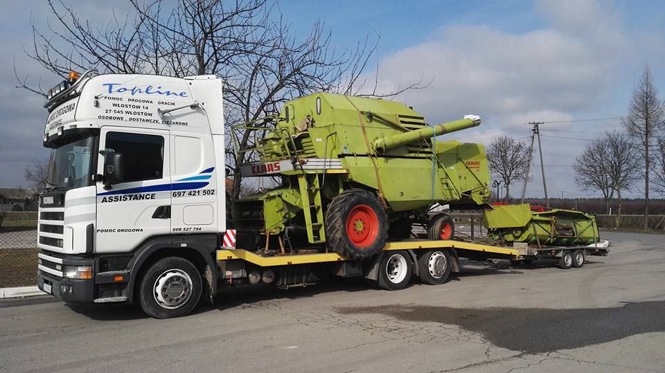 transport maszyn rolniczych holownik laweta pomoc drogowa