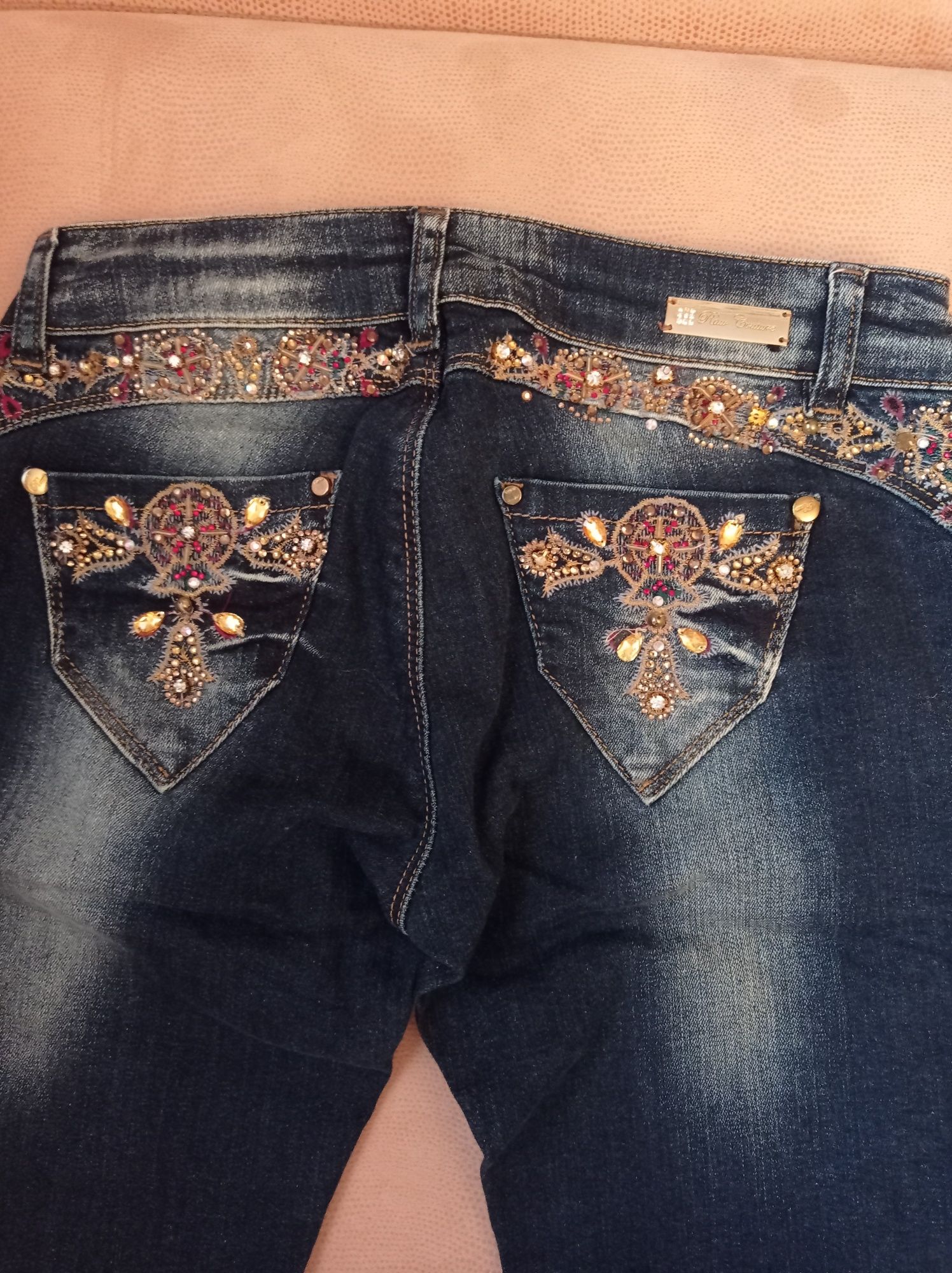 Женские фирмовые джинсы