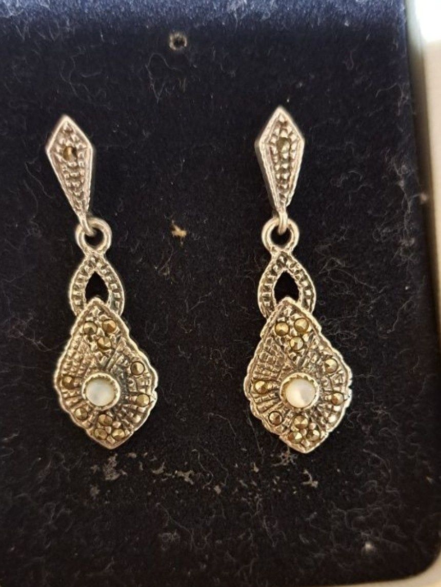 Brincos Raros vintage em prata .