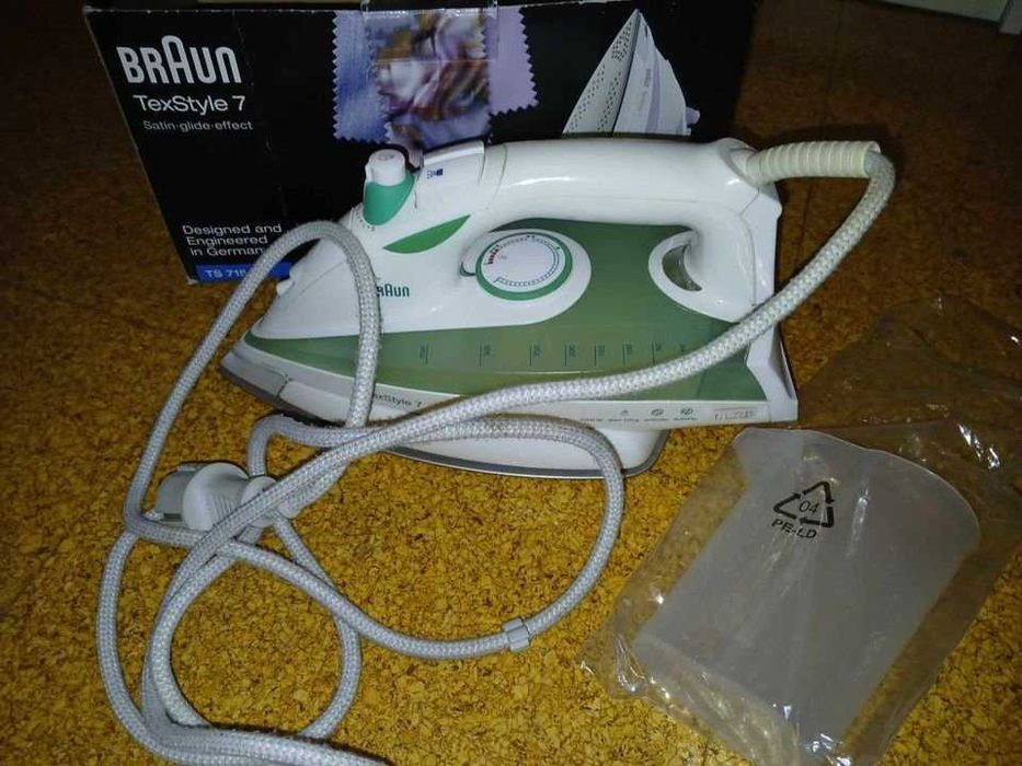 Ferro de engomar a vapor da Braun