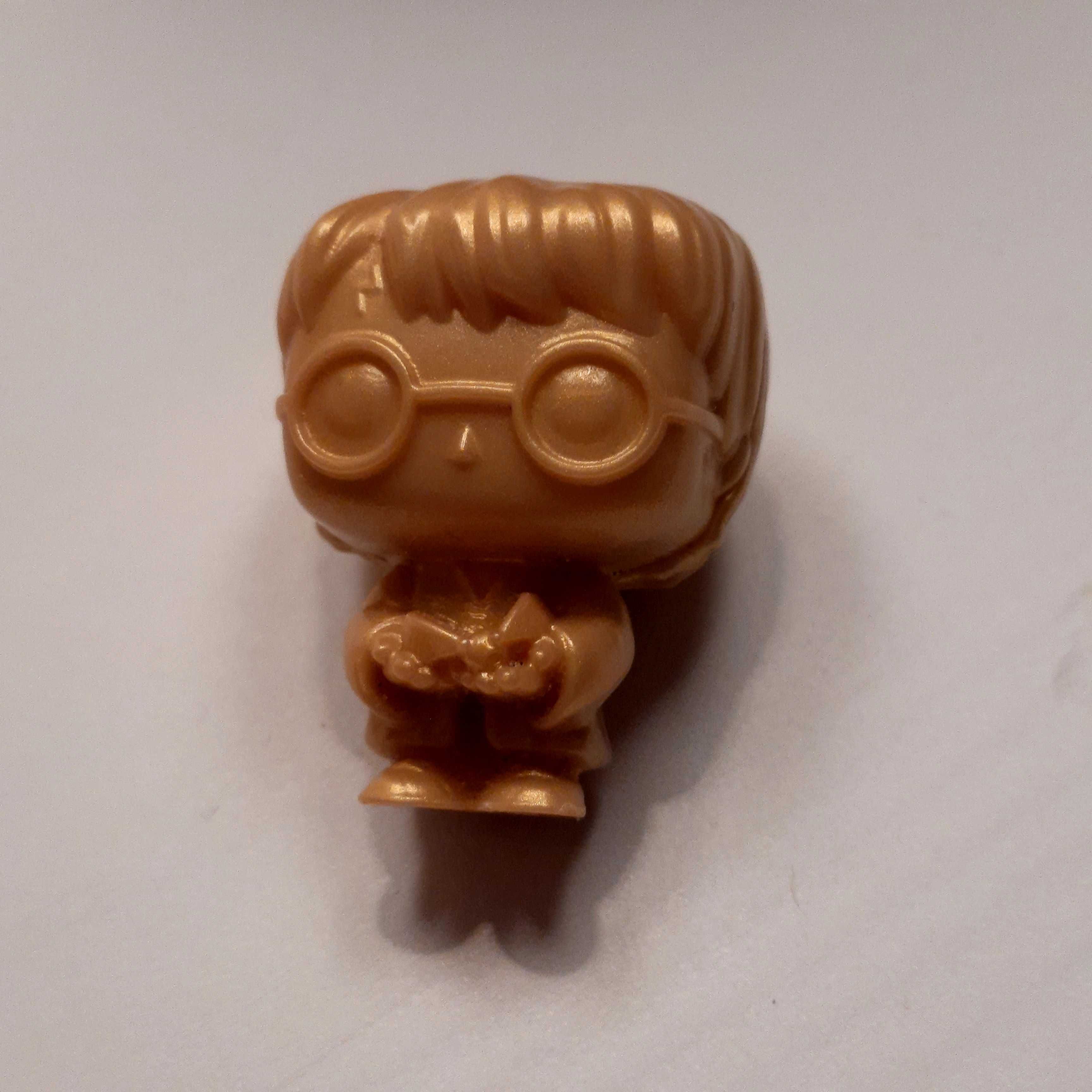 Złota figurka Harry Potter