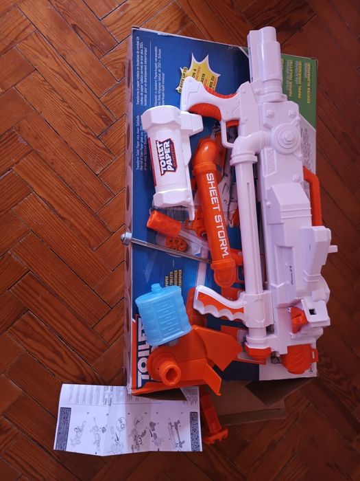 Pistola tipo NERF - Dispara Papel Higiénico