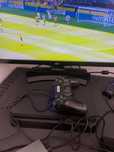 PS4 com comando em bom estado
