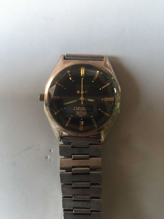Часы "ORIENT" кварц,made in Japan.