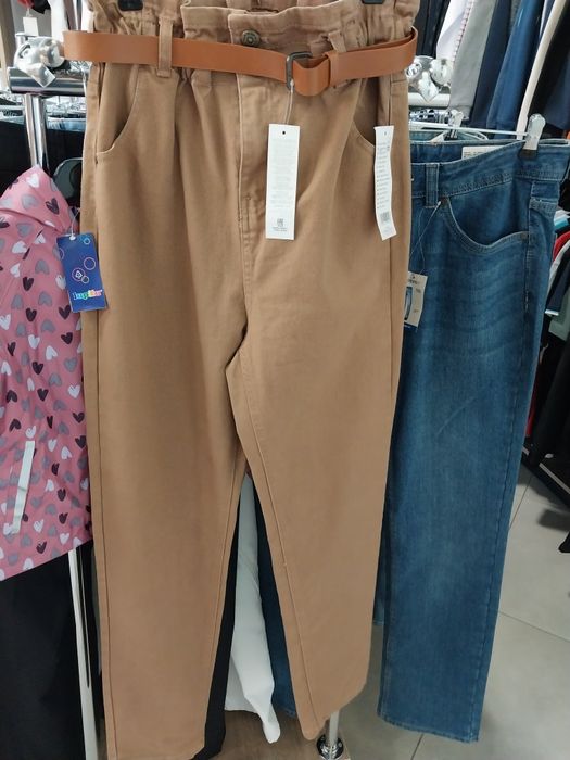 Жіночі брюки фірмові Family store магазин одягу для всієї родини