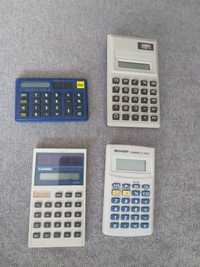 Cztery stare firmowe kolekcjonerskie kalkulatory