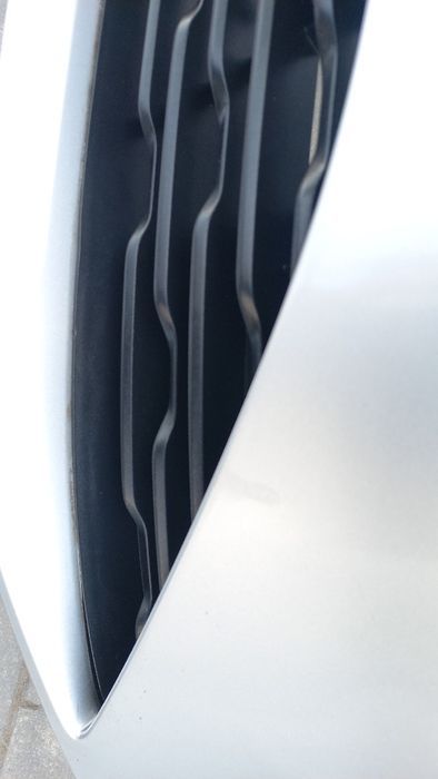 Opel Corsa f 19- zderzak przód przedni srebrny z176