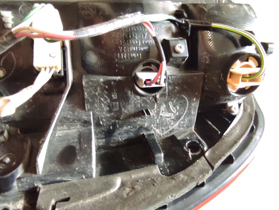 Фонарь лівий зовнішній Toyota LC 100