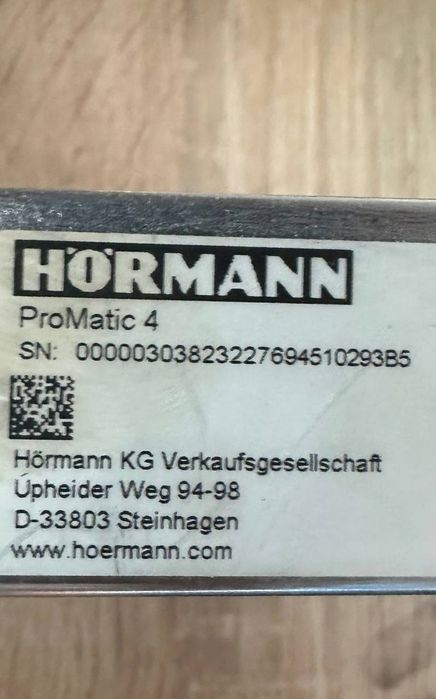 Część zamienna mocowanie od napędu do bramy Pro Matic firmy Hörmann