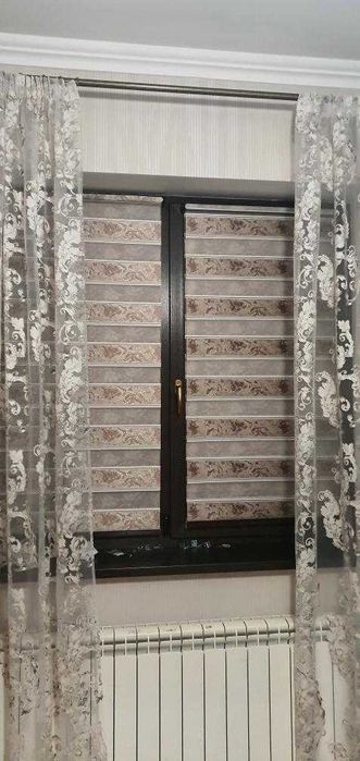 Рулонні жалюзі та тканинні штори «День-Ніч» у Харків від виробника