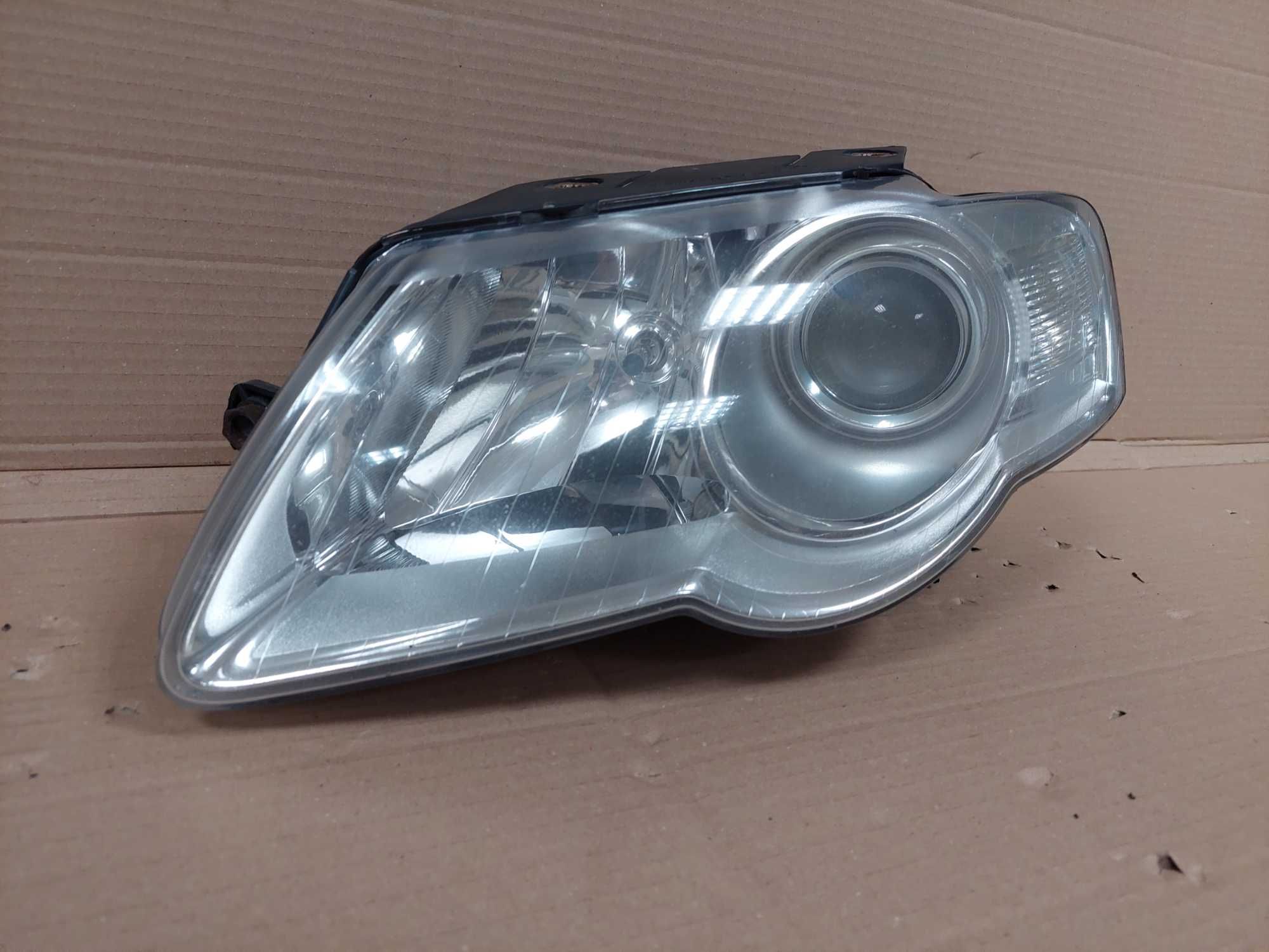 VW Passat B6 05-10r lampa przód lewa zwykła H7 VALEO EU BDB KPL