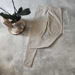 Wygodne beżowe woskowane legginsy H&M