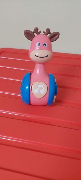 Неваляшка, їздить, пищить