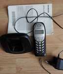 Telefon stacjonarny Siemens z ładowarką i instrukcją