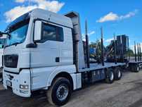 MAN TGX 33.580 6X4 do drewna z HDS Przyczepa Mielke Essen
