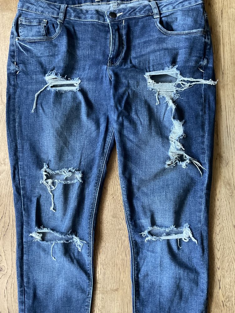 Denim & Co spodnie z dziurami 42