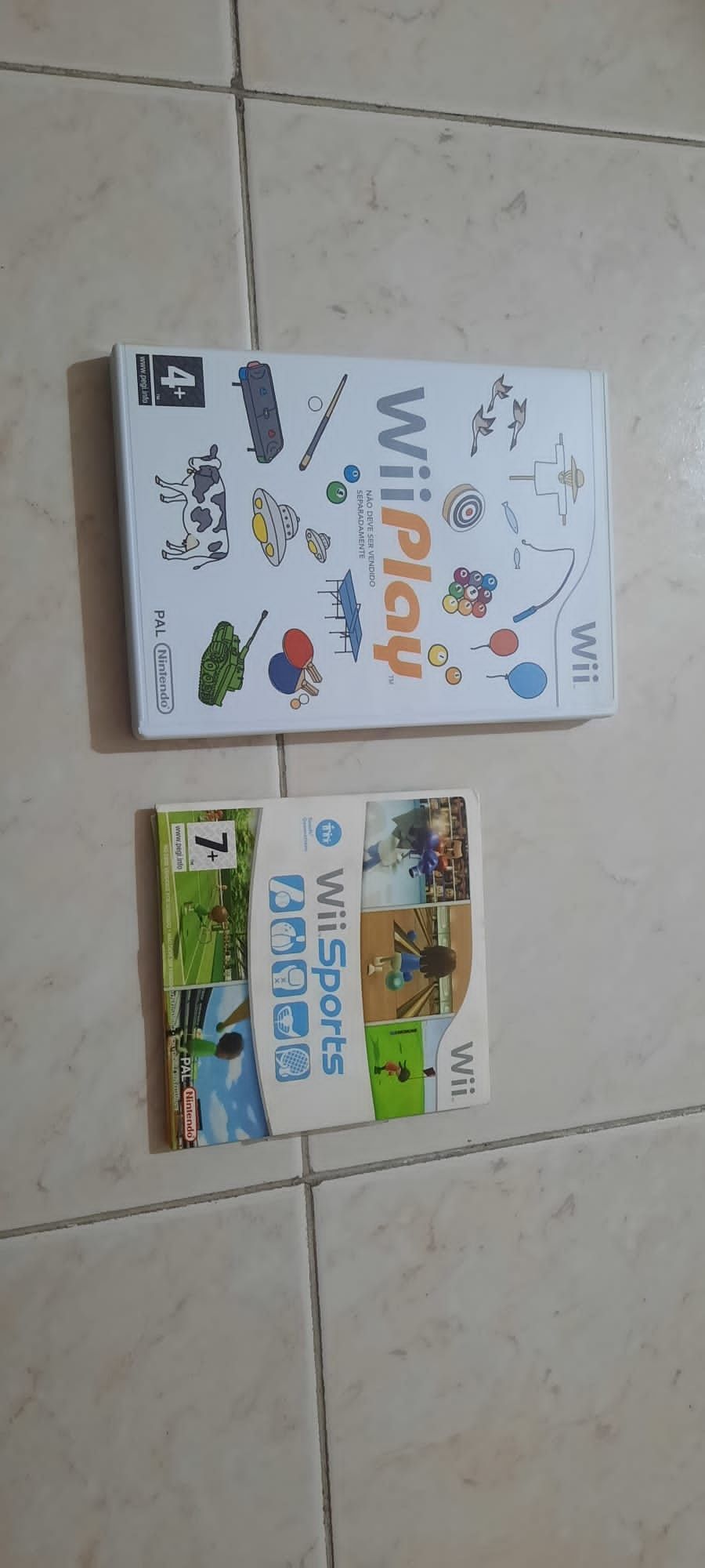Consola Wii com 3 comandos, Wii Fit ,Family Trainer e vários jogos
