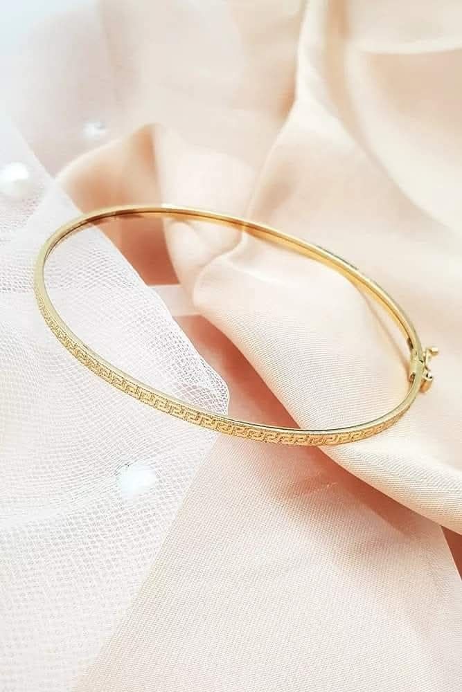 Bransoletka złota diamentowana. Bangle. Wzór grecki