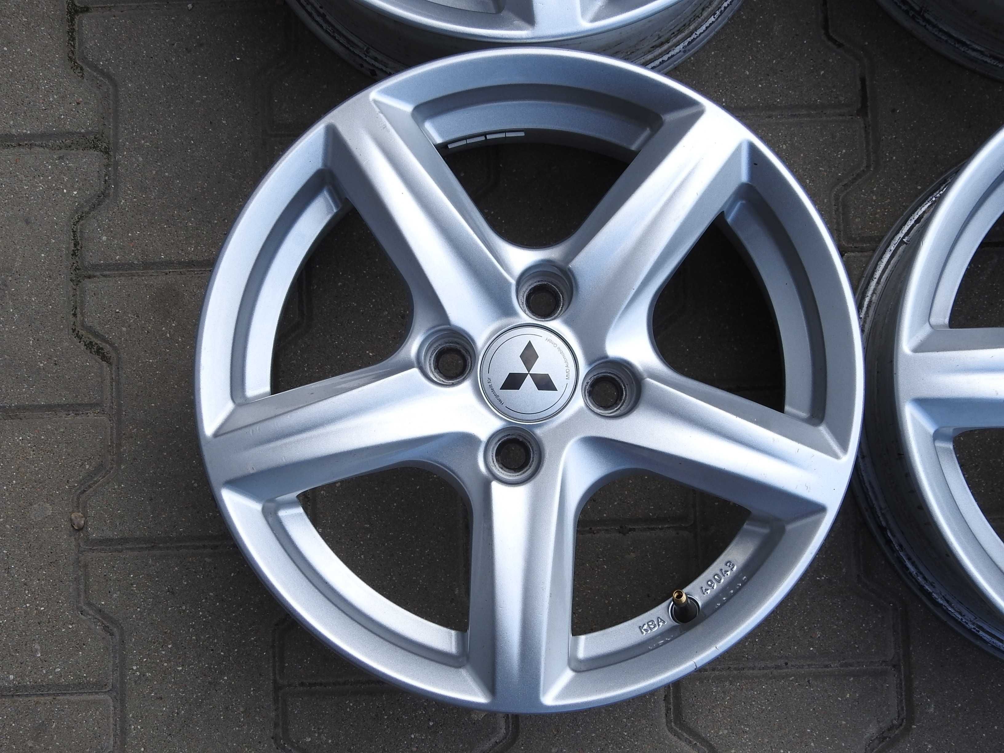 4x Alu 15'' 4x100 6J ET42 Piasta 56,1mm MITSUBISHI z czujnikami TPMS