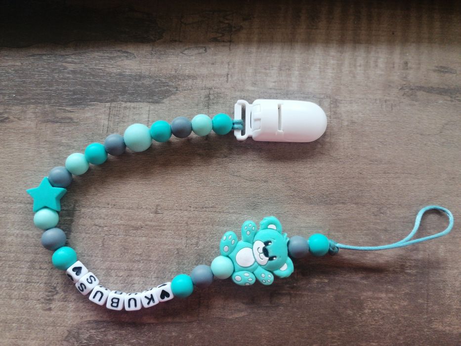 Zawieszka przywieszka silikonowa do smoczka Kubuś kolor miętowy