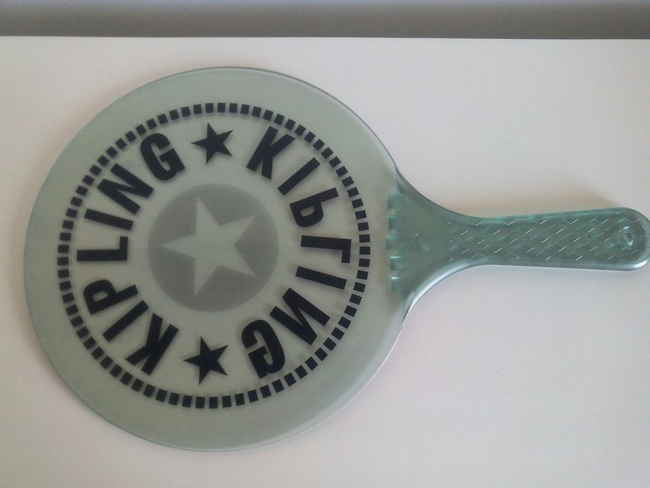 Raquetes Kipling praia